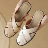 The Woven Leather Flat Mule