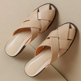 The Woven Leather Flat Mule
