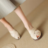 The Woven Leather Flat Mule