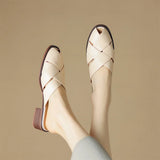 The Woven Leather Flat Mule