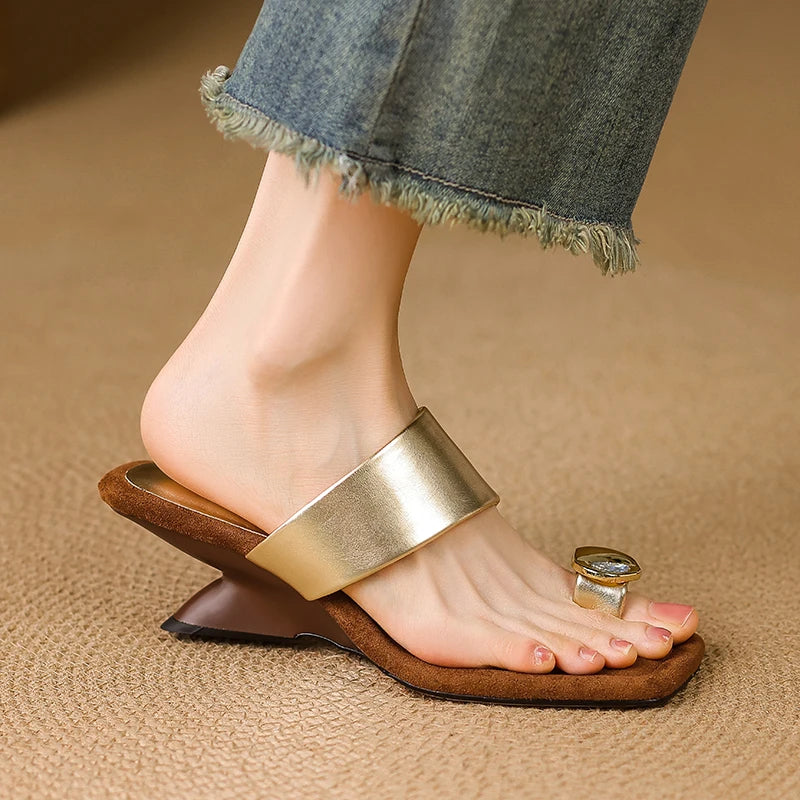 The Metallic Sculptural Heel Slide
