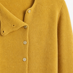 Amélise Asymmetric Button Sweater — Yellow, studio product shot