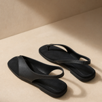 Comporta Genuine Leather Flat Sandal — Black, studio product shot