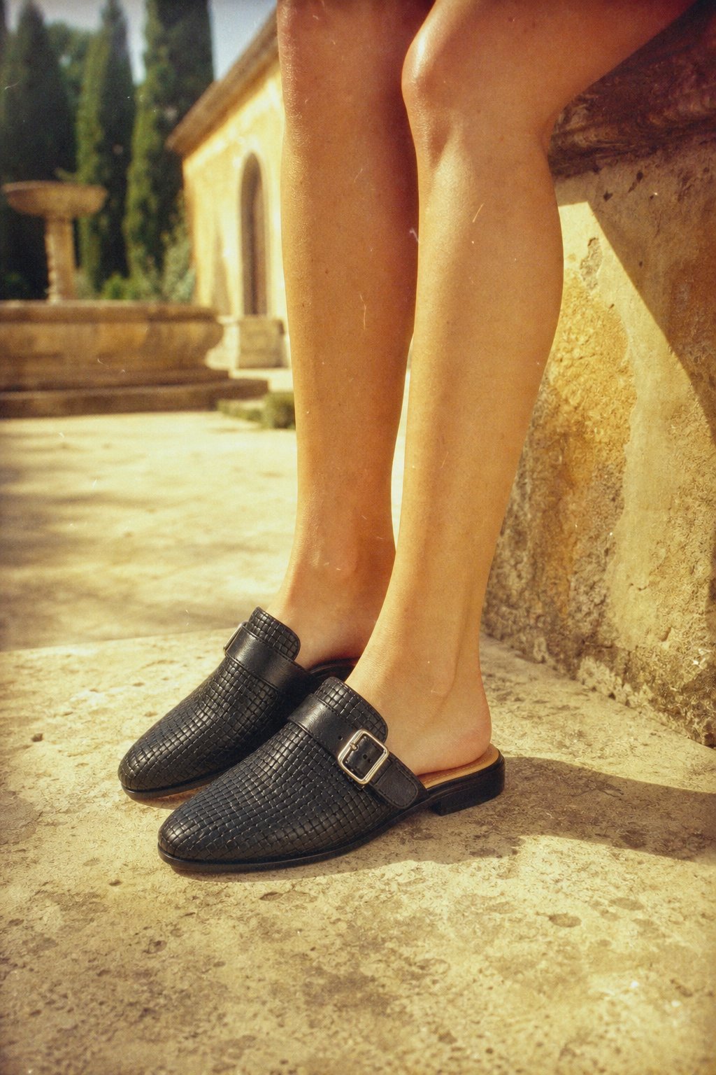 Liora Woven Buckle Mule — Black, studio product shot