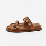 Lucia Buckle Leather Slides — Brown, studio product shot