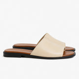 Marin Flat Sandal — Sand, studio product shot