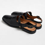 Positano Leather Slingback Flat Sandals — Black, studio product shot