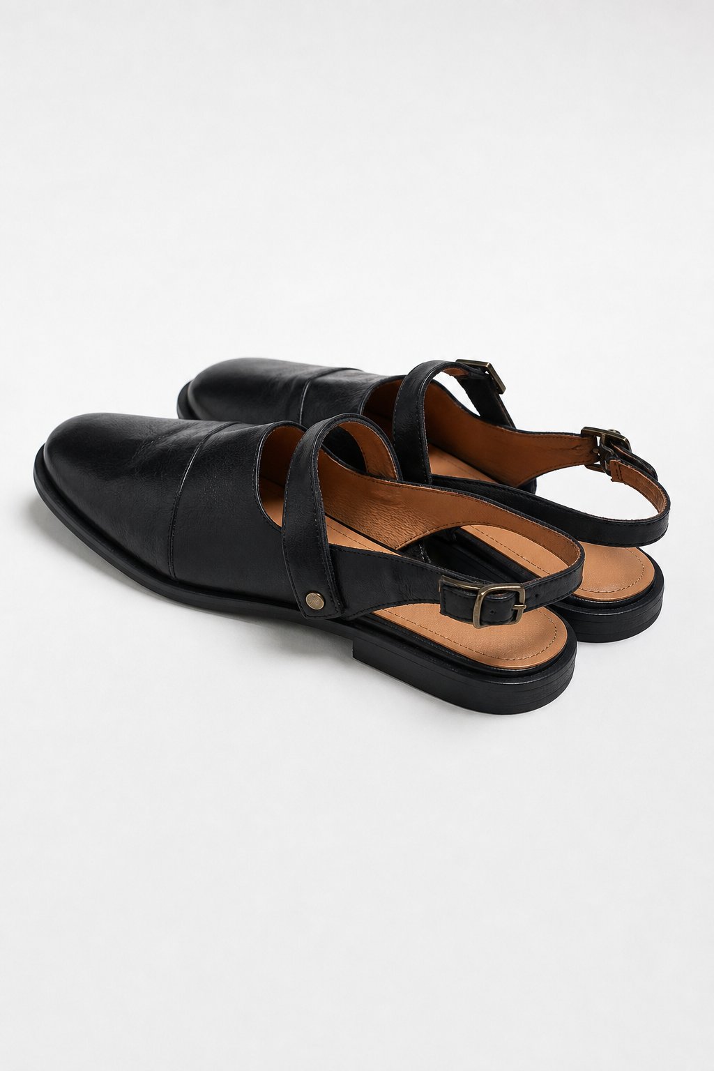 Positano Leather Slingback Flat Sandals — Black, studio product shot