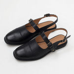 Positano Leather Slingback Flat Sandals — Black, studio product shot