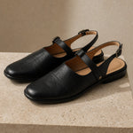 Positano Leather Slingback Flat Sandals — Black, studio product shot