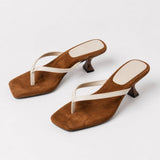 Positano Sculpted Suede Heel — White, studio product shot